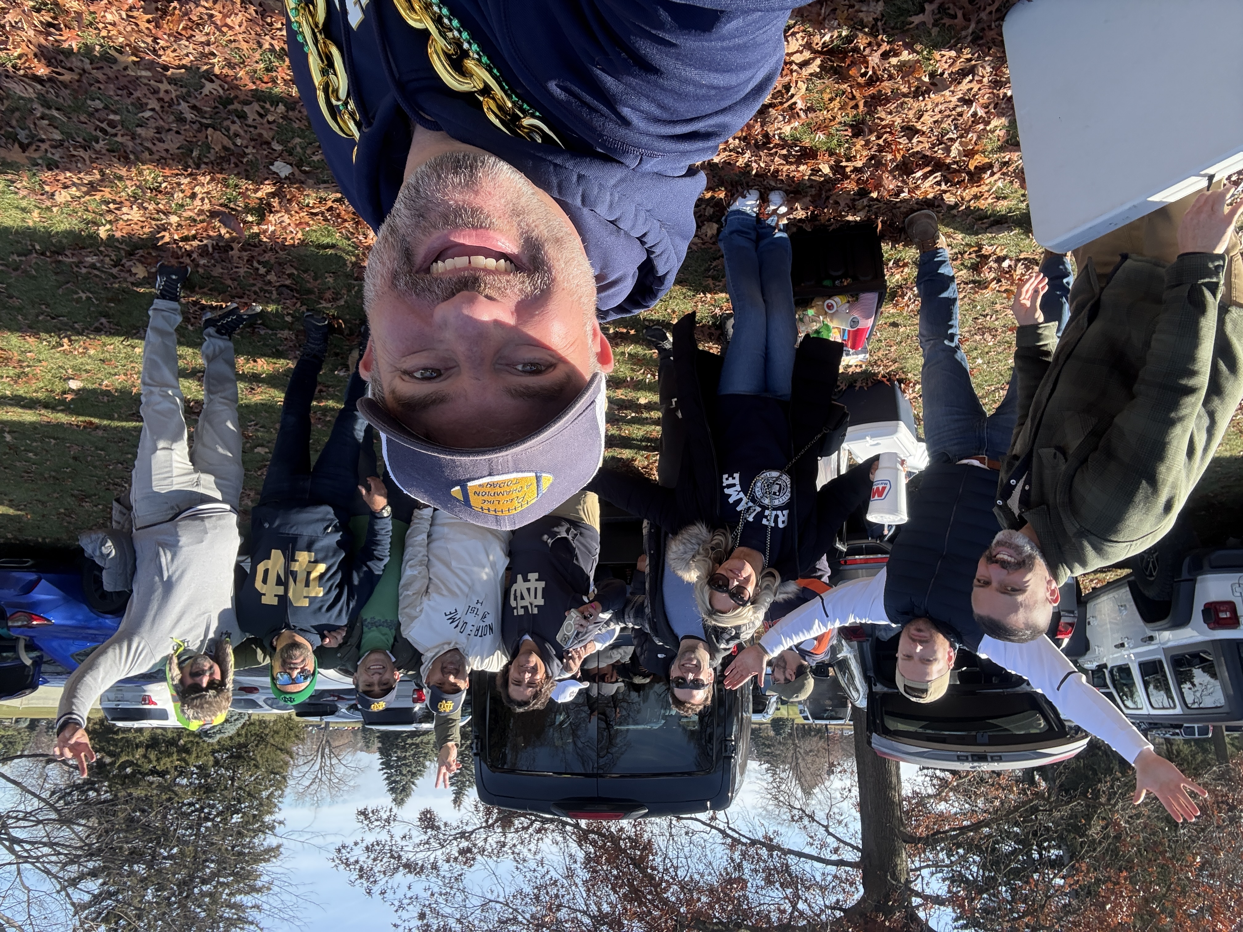 Friends gathered at a football tailgate