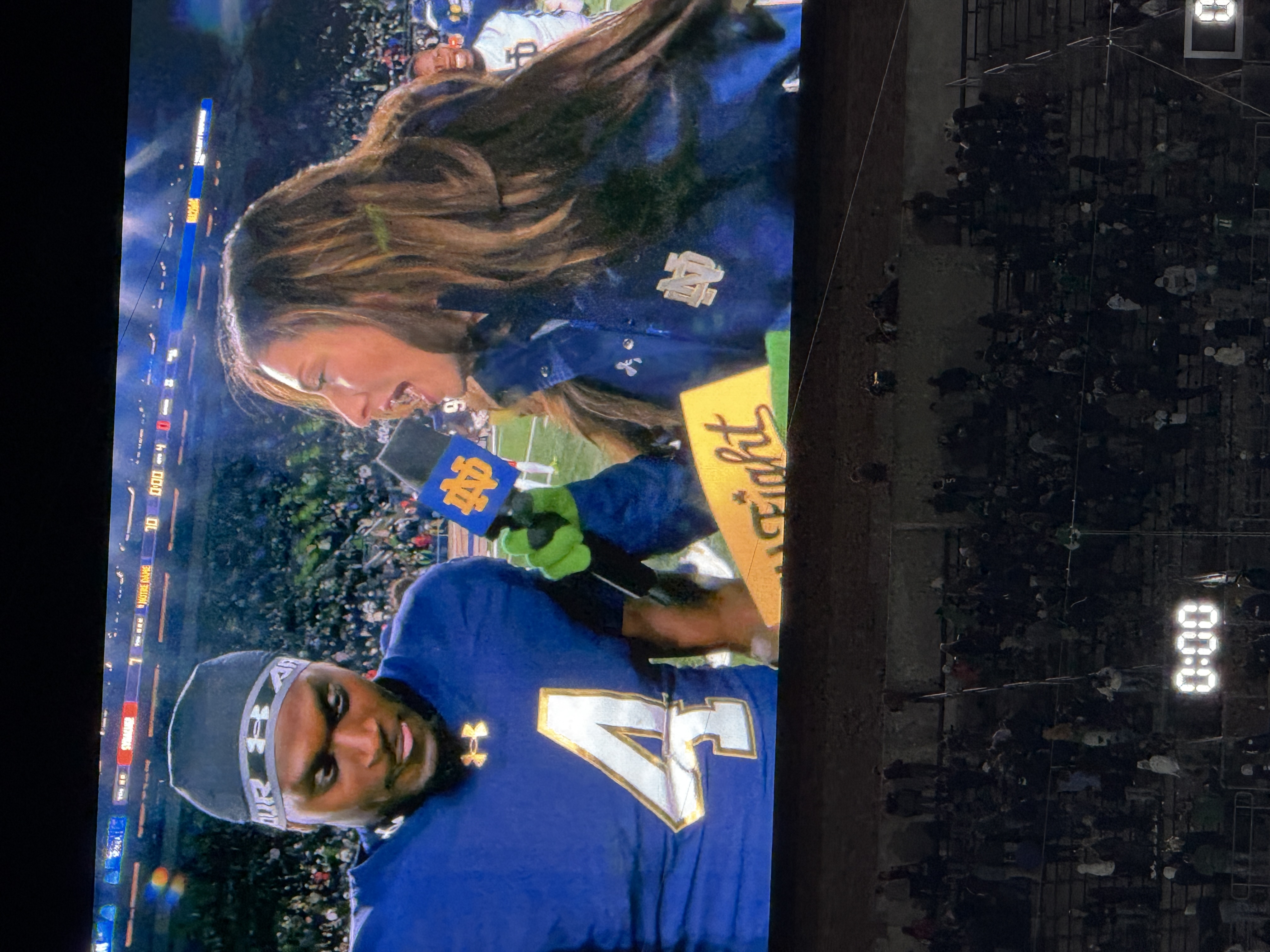 Football stadium video board after a game