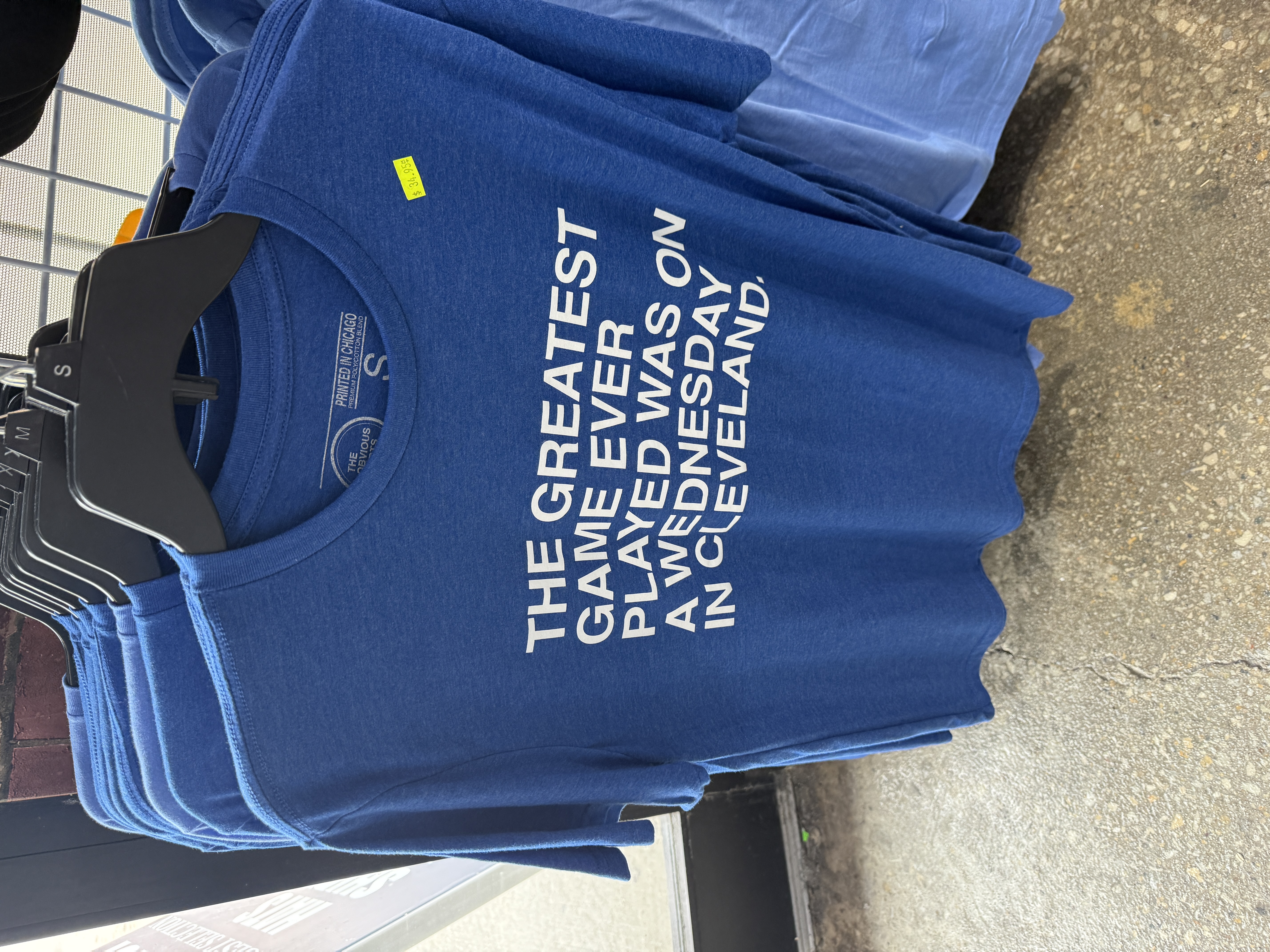 A humorous Chicago baseball T-shirt displayed in Wrigleyville