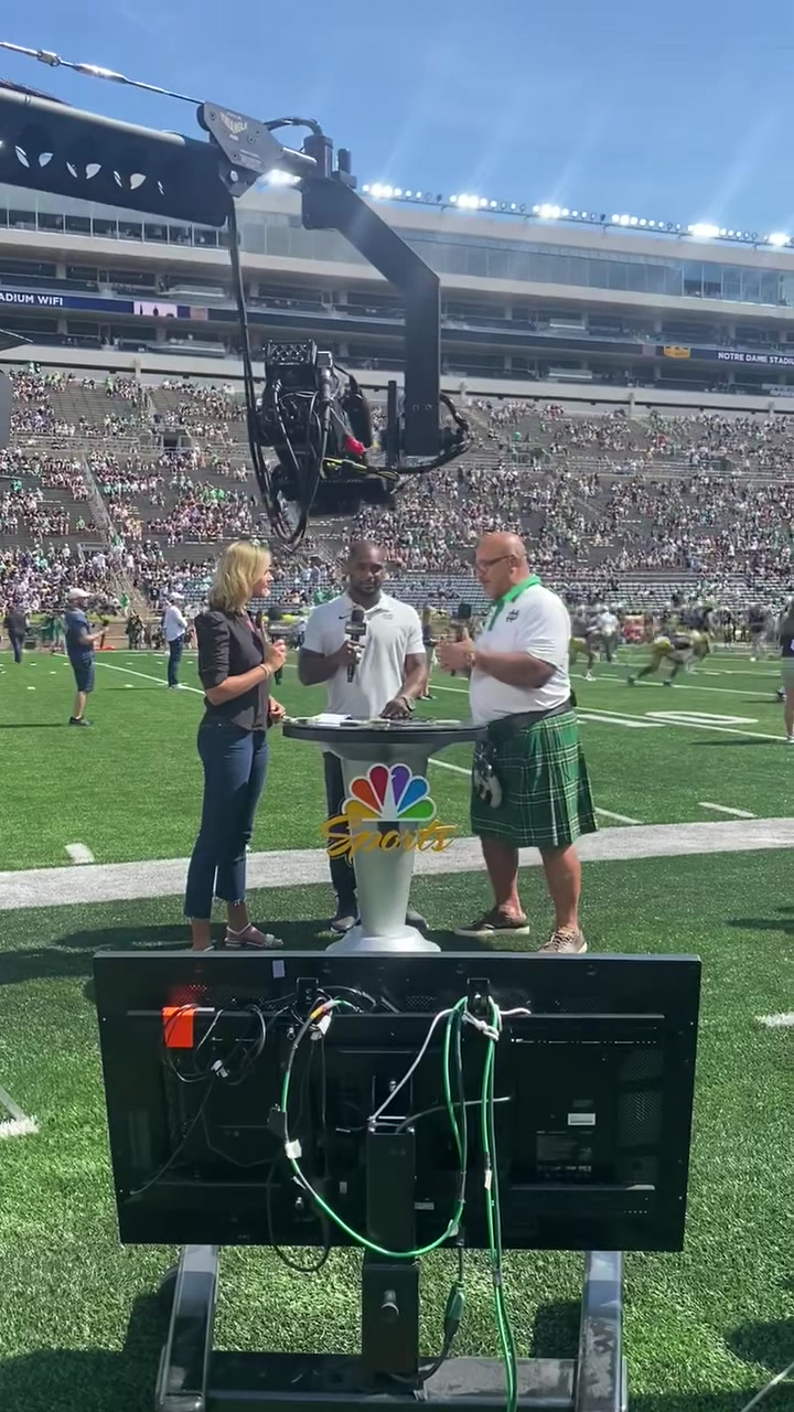 Chris Zorich being interviewed on the field at Notre Dame Stadium