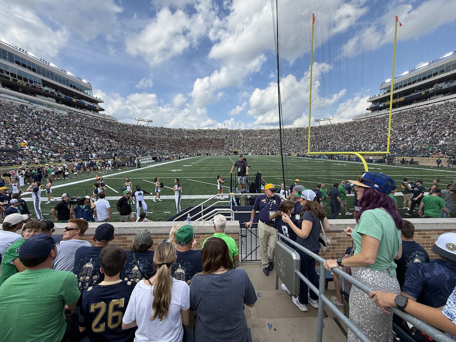 Notre Dame Stadium filled with fans beneath blue skies before the Rice game